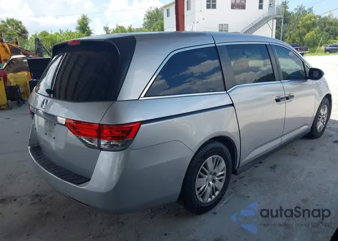 2015 Honda Odyssey Lx z USA, uszkodzony, nr VIN 5FNRL5H21FB039823